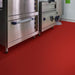 Perfection Floor Tile Vinyl Coin Tiles in Red Shown in Context of a Commercial Kitchen