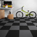 Perfection Floor Tile Vinyl Diamond Tiles in Black Shown in Context of a Home Garage