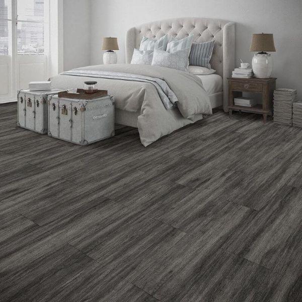 Perfection Floor Tile Breckenridge Wood Luxury Vinyl Tiles - 5mm Thick (20" x 20") with Black Wood Pattern Shown in the Context of a Bedroom