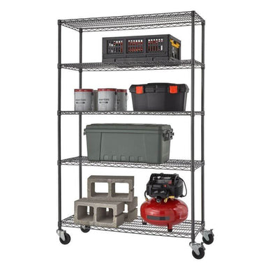 Trinity TBFPBA-0924 (48x18x72) PRO 5-Tier Wire Shelving w/ Wheels in Black Anthracite Color. Shown with common garage, tools and contruction equipment. View from the front right.