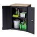 Trinity TLSPBK-0603 (24 in.) Garage Base Cabinet in Black Viewed from Front Right with Drawer Opened and Revealing Cleaning Supplies.