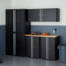 Trinity TLSPBK-0613 (6-Piece) Garage Cabinet Set in Black Placed Against a Wall in a Garage.