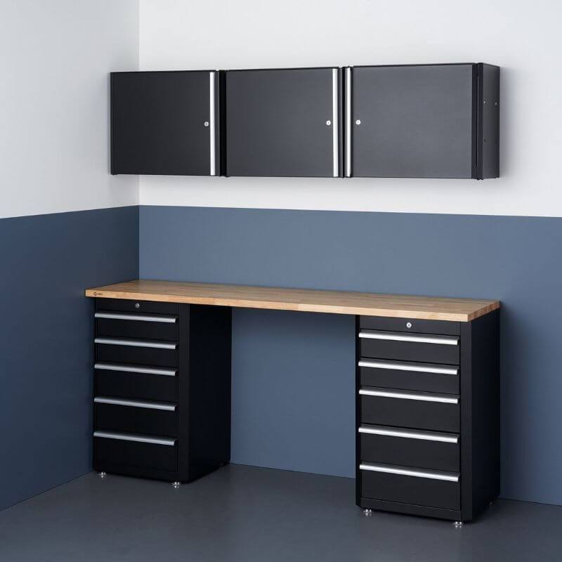 Trinity TLSPBK-0617 (6-Piece) Garage Drawer Set In Black Placed Against a Wall in a Garage.