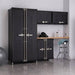 Trinity TSNPBK-0616 (5-Piece) PRO Garage Cabinet Set in Black Placed Against a Wall with Drawers Closed.