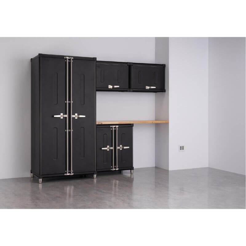 Trinity TSNPBK-0616 (5-Piece) PRO Garage Cabinet Set in Black Placed Against a Wall with Drawers Closed Without Any items Around It